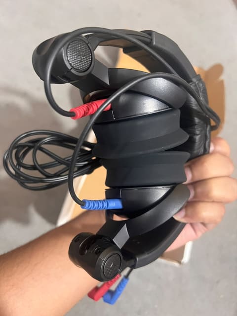 Audiometric headset held in hand